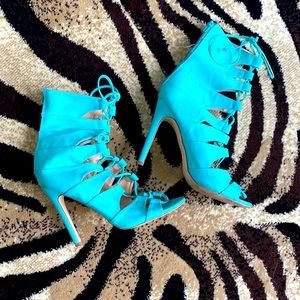 Liliana size 8, front lace up with open toes heels. 4.5”,  turquoise/teal blue.